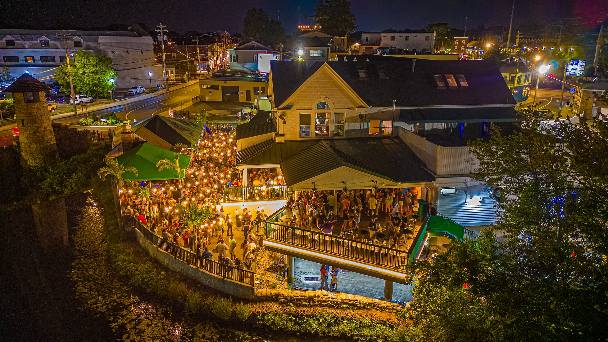 Crowd fills the Stonebridge patio in downtown Milford