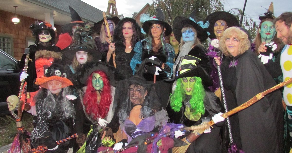 Costumed witches gather for the Walnut Beach Halloween Parade in Milford
