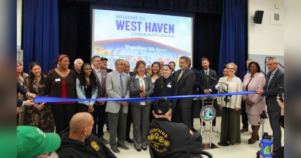 West Haven Mayor Dorinda Borer cuts the ribbon at the new West Haven Community Center, the Hub, at 255 Meloy Road